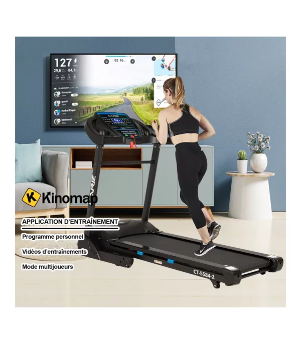 femme qui court sur le Tapis de course pliable - FITRUN PRO devant la télévision